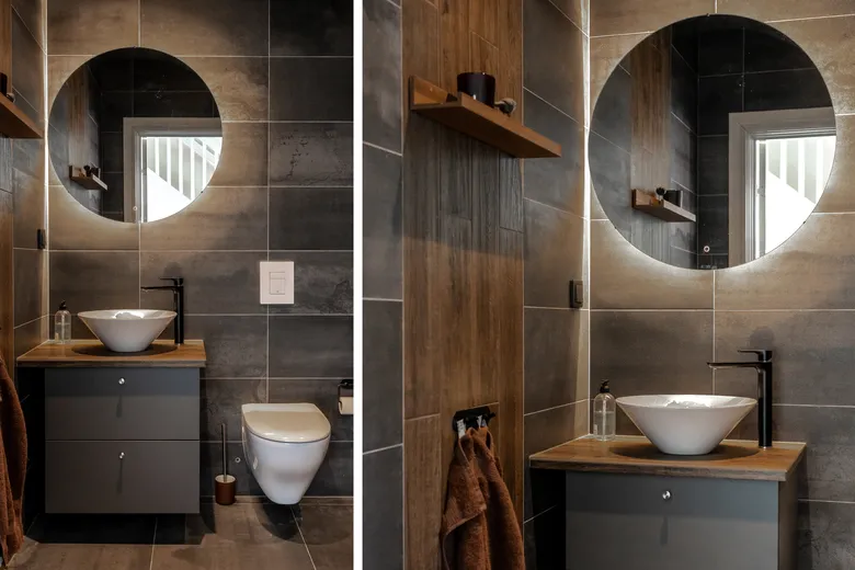 Badrum med mörkt kakel